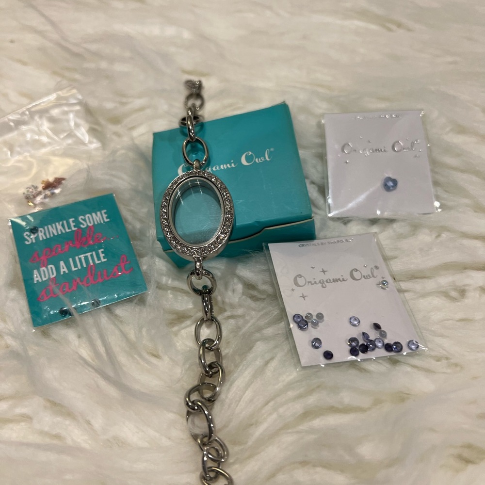 Origami owl locket bracelet with charms and stones- brand new, never used.